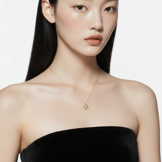 Solid 9ct and 14k Gold Clover Pendant Necklace with Clear Zircon by Qutahia Jewelry
Close-up of Handmade Yellow Gold Clover Pendant Necklace by Qutahia Jewelry
Minimalist Clover Pendant Necklace on 45cm Gold Chain by Qutahia Jewelry