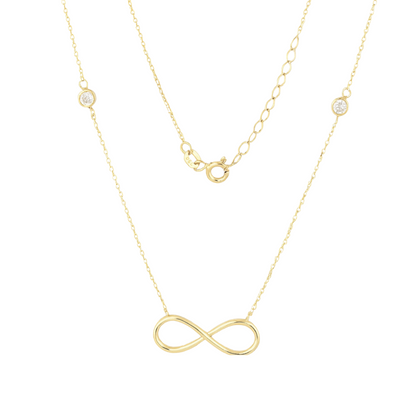 14k solid yellow gold infinity necklace with bezel set zircon on a white background by Qutahia Jewelry