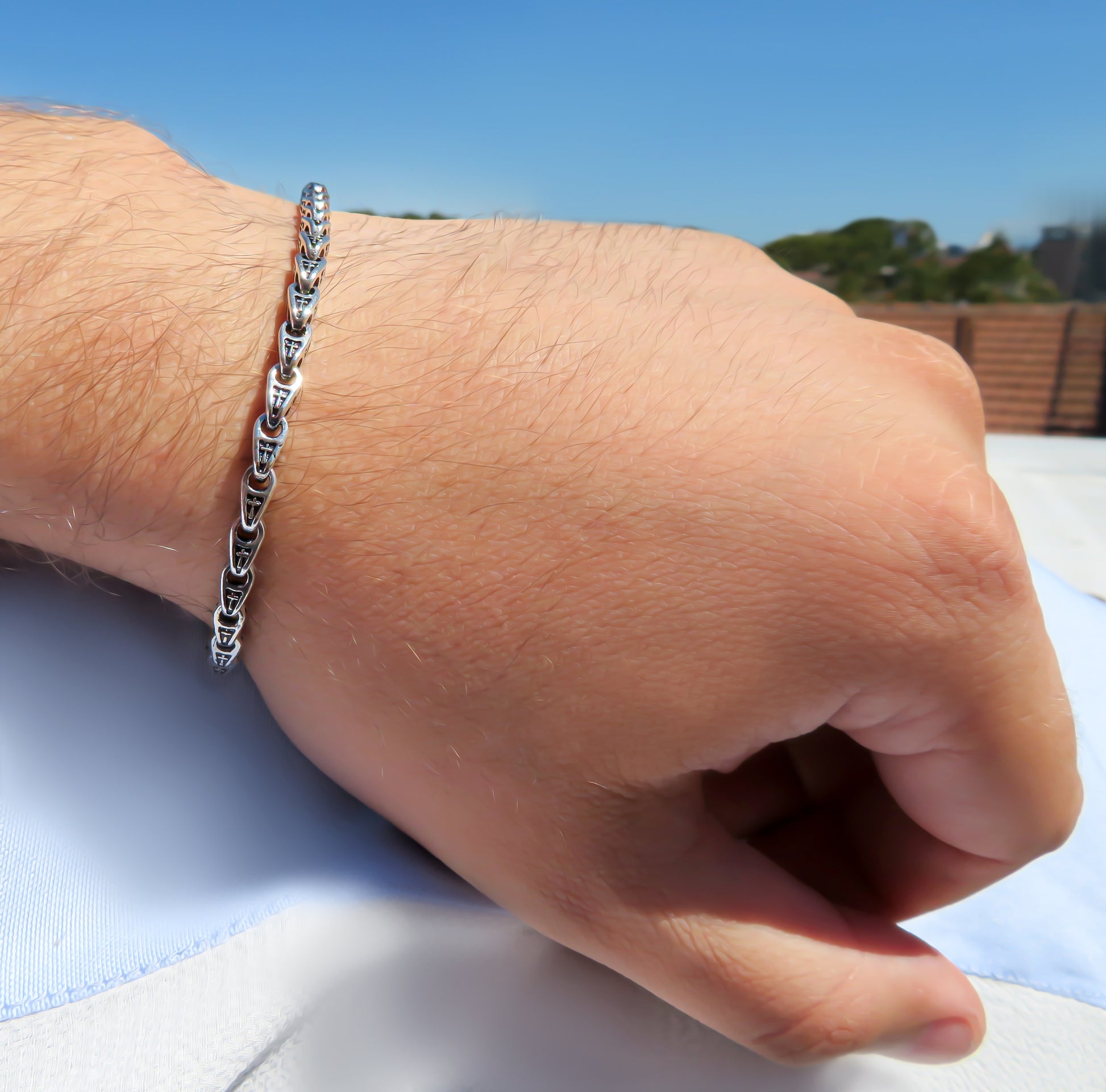 Mens silver bracelet sterling silver with cross motif by Qutahia Jewellery