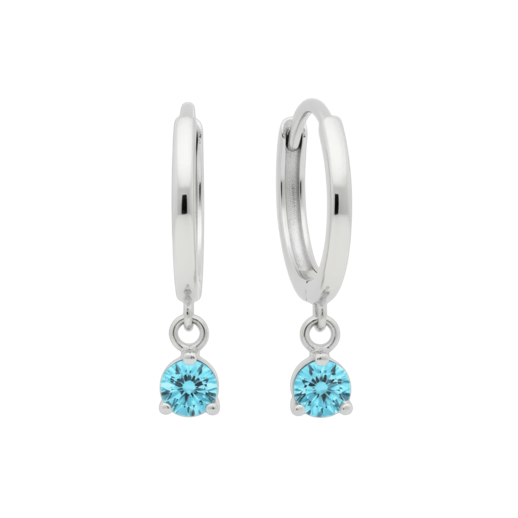 Qutahia Jewelry 14k solid gold dangling huggie earrings with round blue gemstone in claw setting.