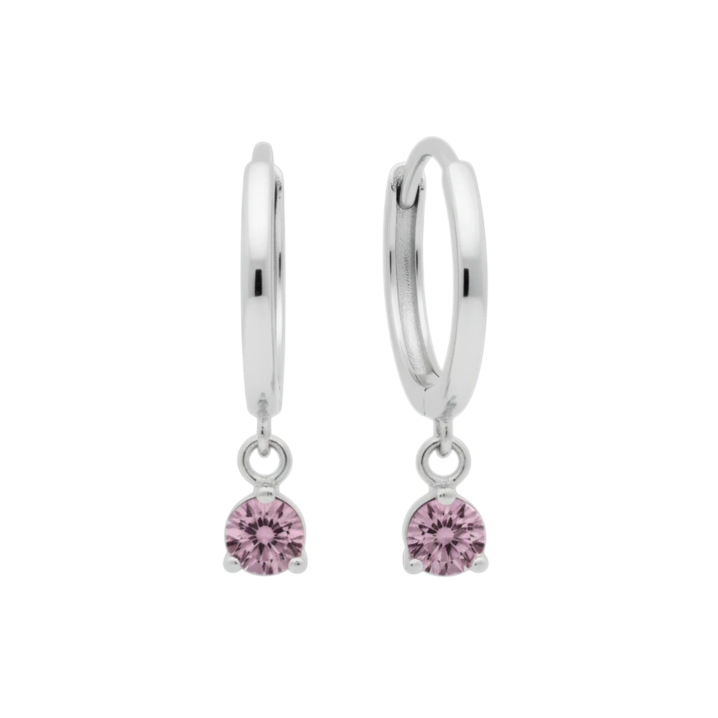 Qutahia Jewelry 14k solid gold dangling huggie earrings with pink claw-set gemstone.