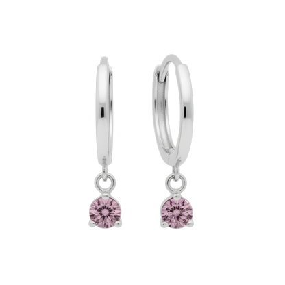 Qutahia Jewelry 14k solid gold dangling huggie earrings with pink claw-set gemstone.