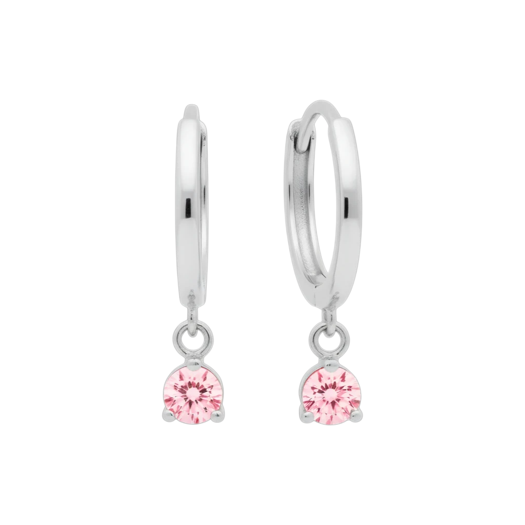 Qutahia Jewelry 14k solid gold huggie earrings with dangling pink solitaire gemstone in claw setting.