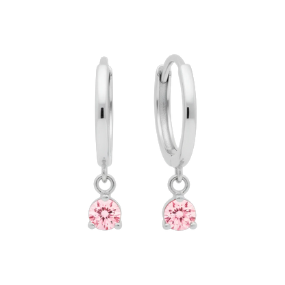 Qutahia Jewelry 14k solid gold huggie earrings with dangling pink solitaire gemstone in claw setting.
